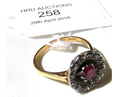 Ruby and diamond ring in gold setting 