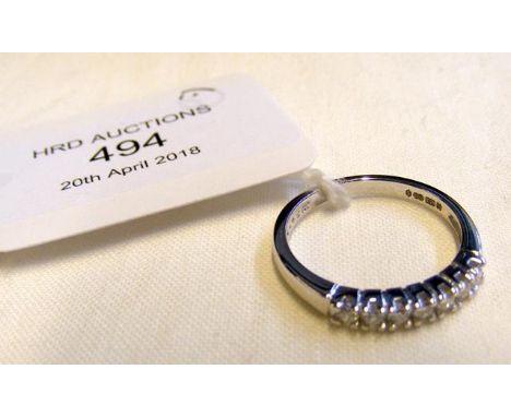An 18ct white gold diamond eternity ring - .25ct total - Size M