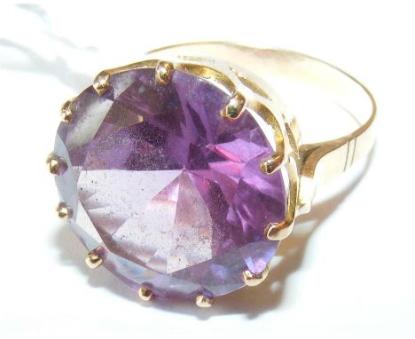 A large amethyst ring in gold setting  CONDITION REPORT size N approx5.3gseems ok18K mark
