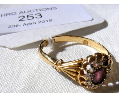 Garnet and diamond ring in 18ct gold setting  