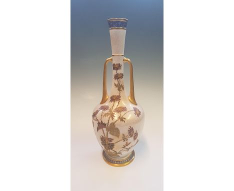 A Royal Worcester two handled vase, decorated gilded and floral detail, height approx. 39cm. IMPORTANT: Online viewing and bi