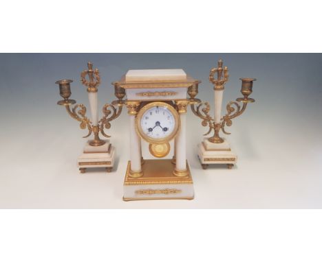 A Maple &amp; Co. Ltd white marble and ormolu mantel clock with four columns, height 27cm, together with a pair of two arm wh