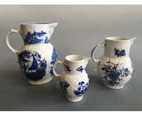 Late 18th century Caughley pattern ‘Fisherman’ pattern mask jug height 25cm, with Caughley parrot pecking fruit pattern mask 
