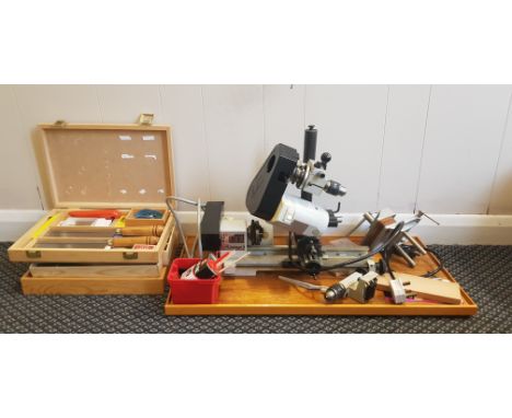 An Emco Unimat 3 lathe, with two boxes of lathe tools.&nbsp;IMPORTANT: Online viewing and bidding only. Collection by appoint