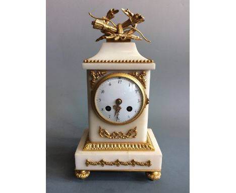 A G Megnin white marble mantel clock with ormolu swag detail, height 31cm.&nbsp;IMPORTANT: Online viewing and bidding only. C
