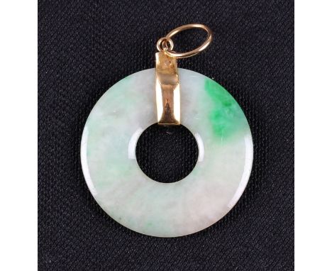 A green jadeite jade pi disc pendant, unmarked yellow metal mount, diameter approx. 2.5cm. On line viewing and bidding only. 