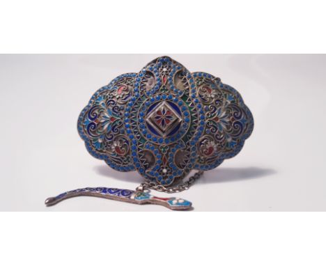 A white metal and enamel multi-coloured converted belt buckle to brooch with safety chain and Jambiya dagger dropper, approx.