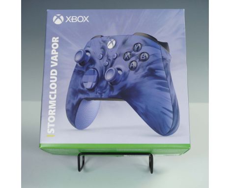 Microsoft Xbox Wireless Controller in the Stormcloud Vapor special edition design, featuring a dynamic blue swirl pattern uni