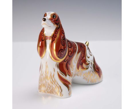 Finely crafted in English bone china, this Royal Crown Derby figurine titled American Spaniel showcases rich detailing in dee