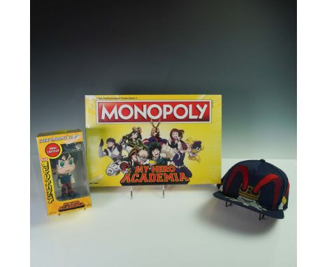 This lot includes three My Hero Academia themed collectibles. The first is a sealed Monopoly My Hero Academia Edition board g