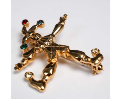 Gold-tone jester brooch by Nat Landau Hyman, marked NLH on the reverse. The articulated figure features a whimsical jester de