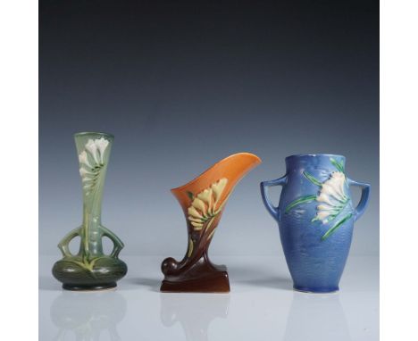 Beautiful collection of three Roseville Pottery vases in the highly collectible Freesia pattern, known for its richly texture