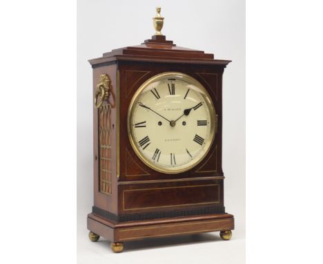 Regency figured mahogany bracket clock, stepped sarcophagus top with turned brass finial, grille panelled sides, acanthus rin