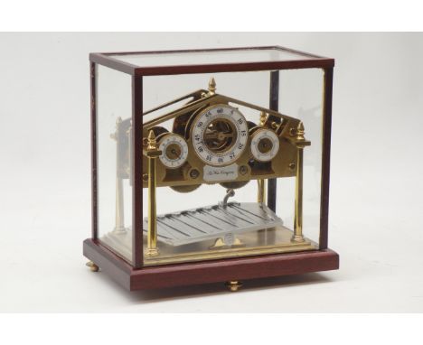 Devon Clocks - Congreve type brass 'Rolling Ball' clock, with Arabic hour, minute and second dials, four turned pillar suppor