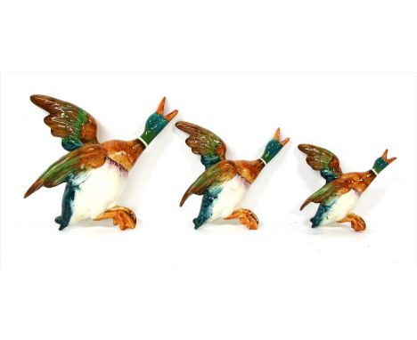 A set of three graduated Beswick wall ducks