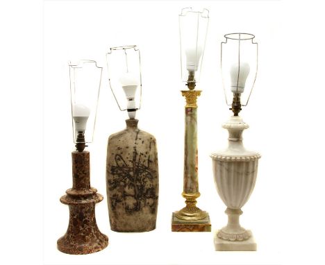 A collection of four table lamps,&nbsp;to include an onyx Corinthian column lamp, a Tremaen pottery lamp, a veined marble exa