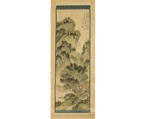 A Chinese hanging scroll, painted with a fisherman on a boat in a mountainous landscape with trees and a pavilion, inscribed 