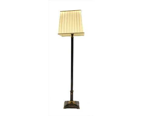 A black lacquered standard lamp, with a fluted column and shade  Provenance: The property of the late Mr & Mrs Brian Lister, 