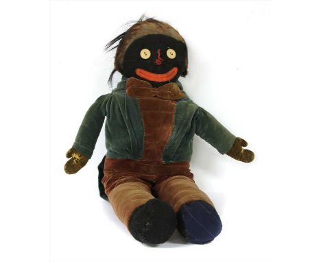 A vintage musical Golly doll, with button eyes (a/f)