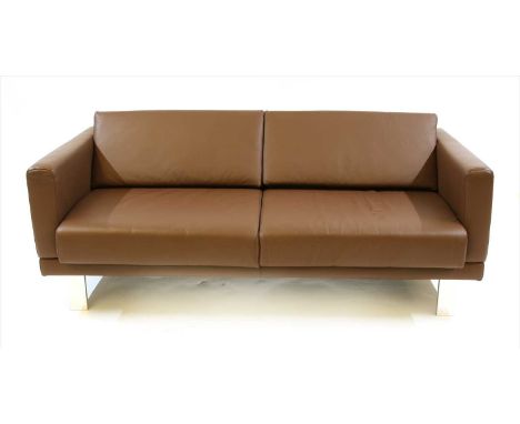 A modern Boss design brown leather two seater sofa , 179cm wide, 88cm deep, 76cm high