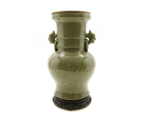 A Chinese celadon vase, table lamp and a hardwood stand, 37cm high Provenance: The property of the late Mr &amp; Mrs Brian Li