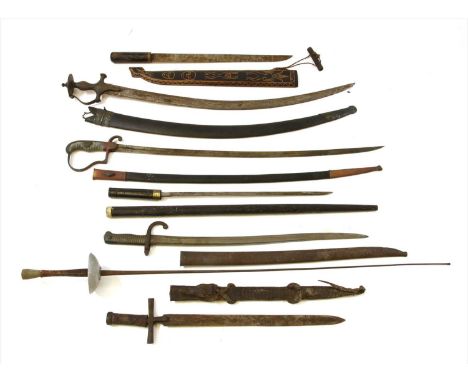 A collection of edged weapons, to include a French bayonet, a Wilkinson fencing foil, a short sword with a baby crocodile sca