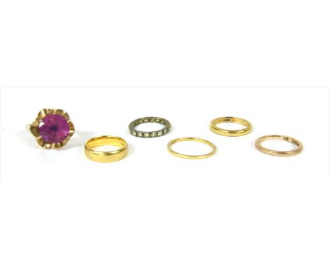 A quantity of gold rings, to include a 9ct gold wedding ring, London 1944, utility mark, finger size L½, three 22ct gold wedd