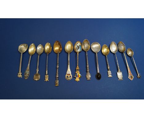 Thirteen various silver and metal commemorative spoons, including a .800 and enamel Nurnberg example.