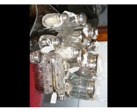 Selection of silver top scent bottles 