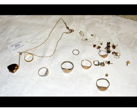A silver ring, heart locket, etc. 