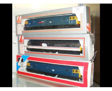 A boxed Lima locomotive, together with two others 