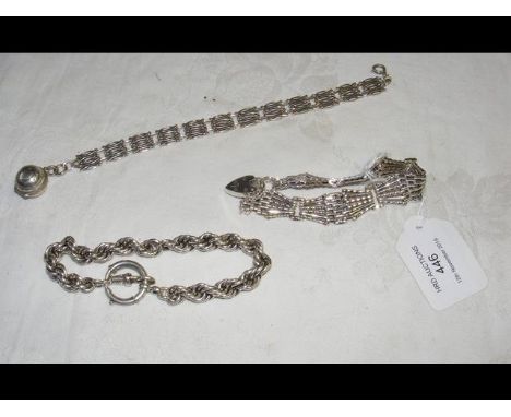 A silver gate bracelet, etc. 