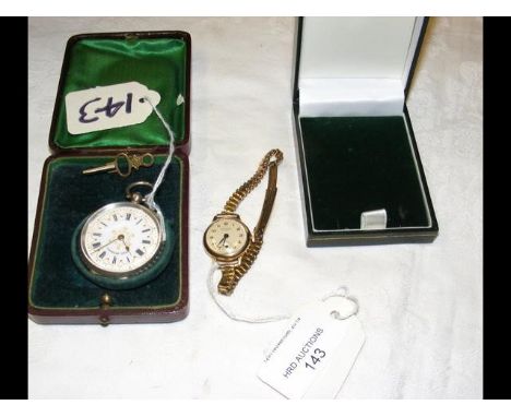 A lady's silver cased pocket watch, together with a lady's 9ct gold wrist watch CONDITION REPORTwatch runsbracelet marked 375