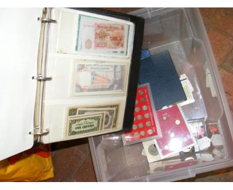 An album of collectable banknotes from around the world, together with GB silver threepence's and other  CONDITION REPORTas p