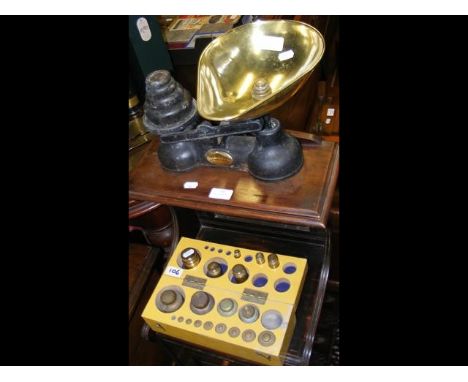 A set of scales, together with various weights 
