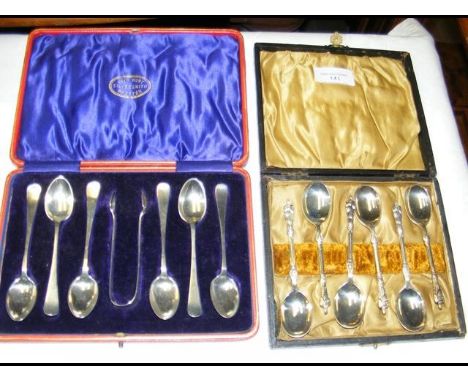 A cased set of six silver Apostle spoons, together with a set of six silver teaspoons and sugar tongs in presentation case 