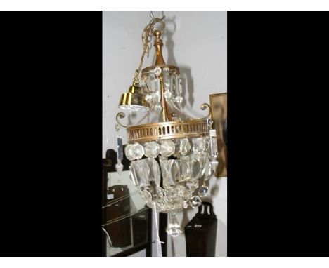 An early 20th century cut glass ceiling light 