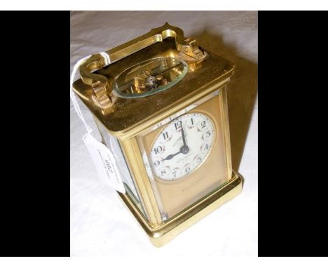 An eight-day brass cased French carriage clock by Dimmer &amp; Son, Southsea - 13cm high CONDITION REPORTBalance wheel needs 