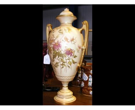 A Royal Worcester two handled vase with hand painted floral decoration - 42cm high 