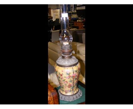 A 60cm high antique oil lamp CONDITION REPORTDamage to funnel