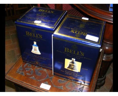 An unopened Bell's Extra Special Old Scotch Whisky '50th Golden Wedding Anniversary' decanter in original box, together with 