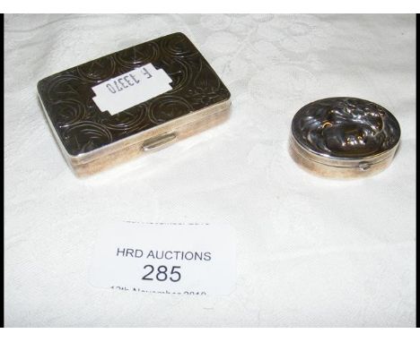 A silver continental pill box and one other 