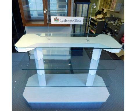 A china display shelf, with white composition stand and glass shelves.  NB. Collection for this lot is from 2 Albion Hill, Ep