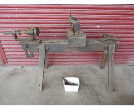 A vintage Jonas Woodhead &amp; Sons lathe, on pine stand 