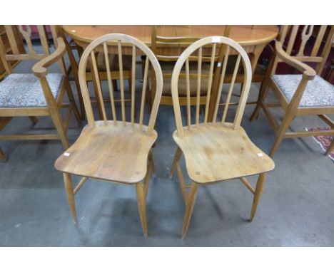 A pair of Ercol Blonde elm and beech Windsor chairs 