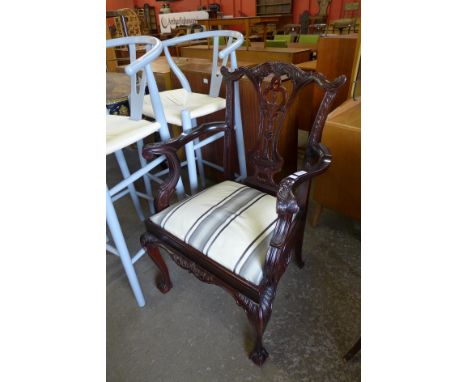 A Chippendale style mahogany elbow chair 
