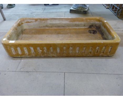 A Victorian saltglazed stone sink/planter 