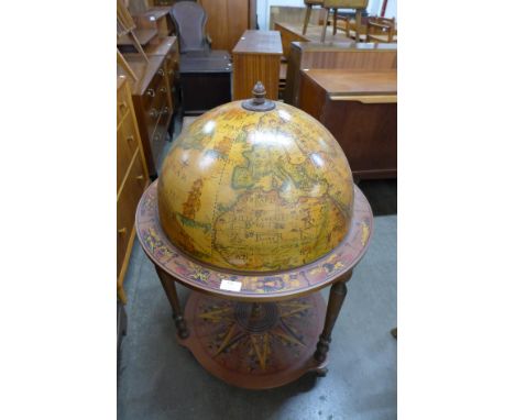 A terrestrial globe cocktail cabinet/trolley 