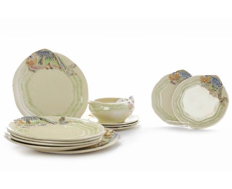LOT OF CLARICE CLIFF FISH SERVICE DINNER WAREeach stamped 'Clarice Cliff for Wilkinson', comprising a sauce boat, five side p