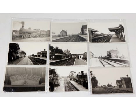 A large quantity of postcards and black & white and colour photographs, locomotives and tracks and stations, including, Brans